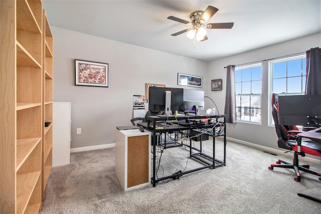 carpeted office with ceiling fan