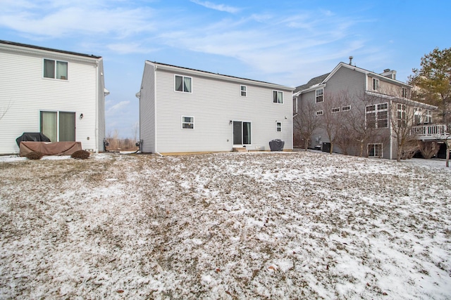 view of snow covered property