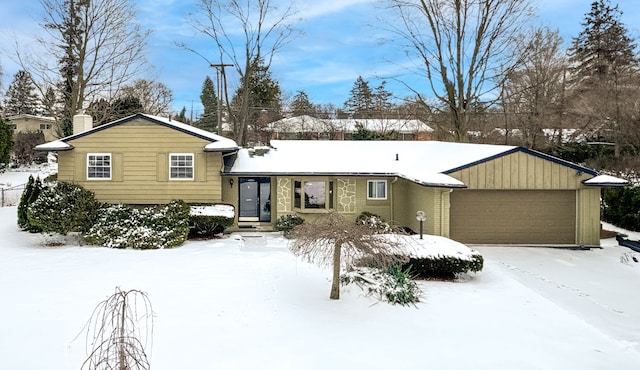 view of front of property featuring a garage