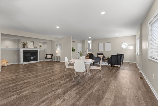 dining room with dark wood-type flooring