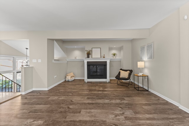 living area with hardwood / wood-style flooring