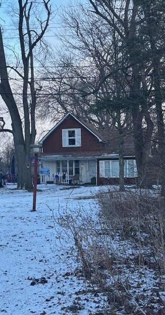 view of snow covered house