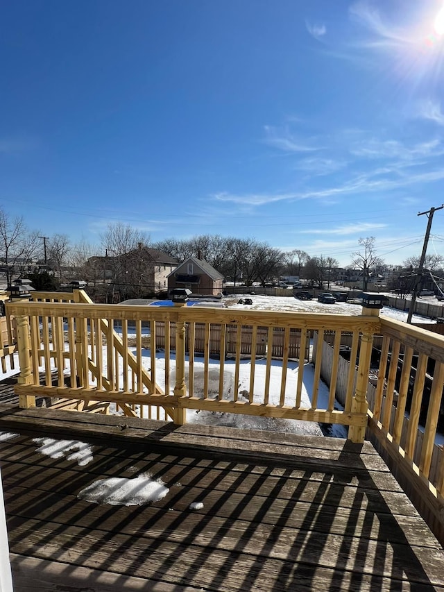 view of snow covered deck