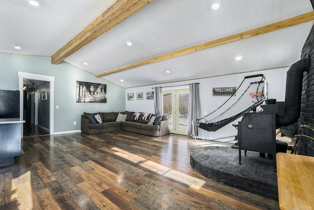 living room with wooden ceiling, lofted ceiling with beams, a wood stove, and dark hardwood / wood-style floors