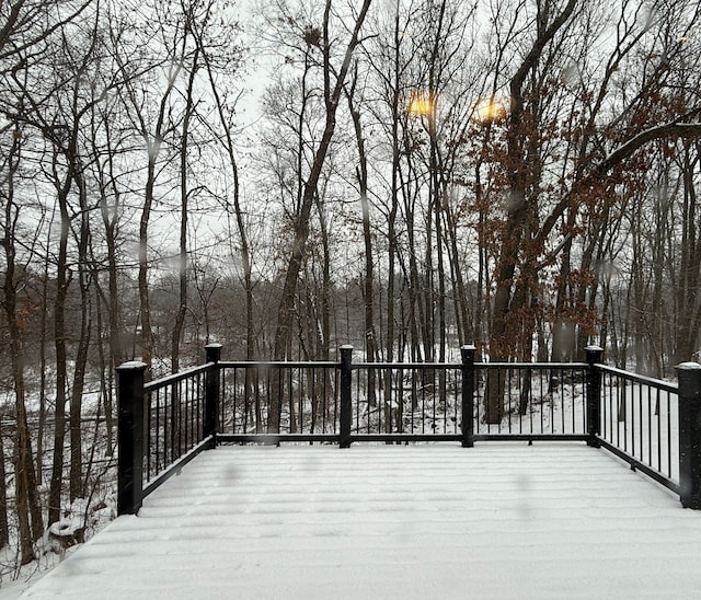 view of snow covered deck