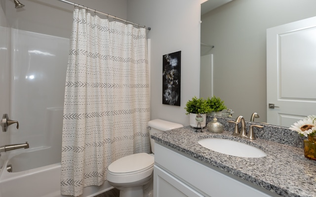 full bathroom with toilet, shower / tub combo, and vanity