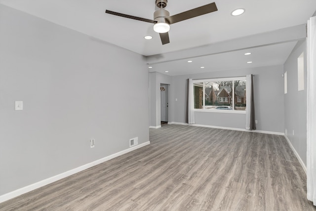 unfurnished room featuring ceiling fan and light wood-type flooring