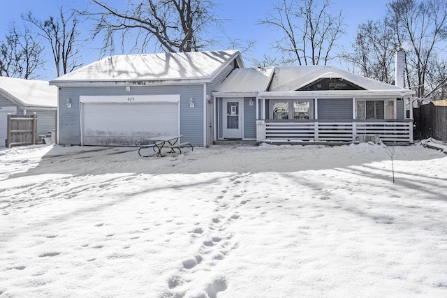 ranch-style house featuring a garage