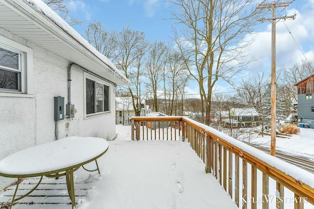 view of snow covered deck