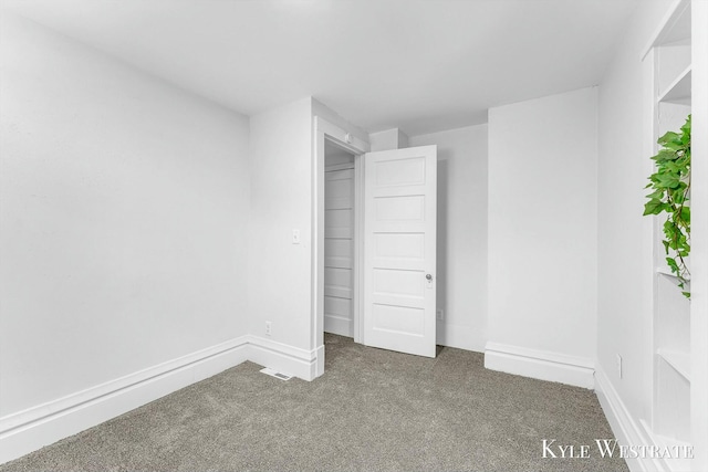 unfurnished bedroom featuring carpet flooring