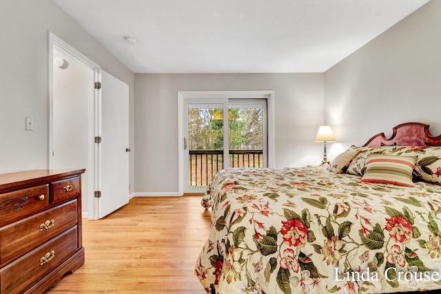 bedroom featuring access to outside and light hardwood / wood-style floors