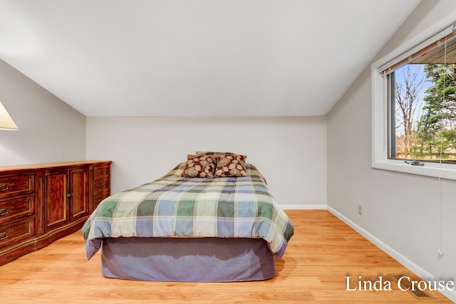 bedroom with light hardwood / wood-style floors