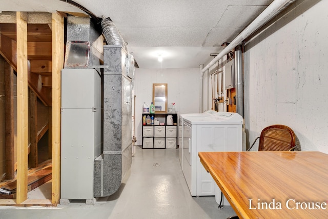 basement with washer and clothes dryer