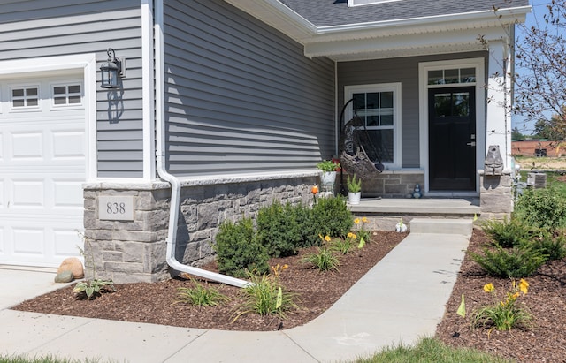 entrance to property with a garage