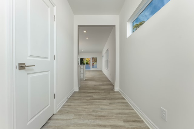 hallway featuring light hardwood / wood-style flooring