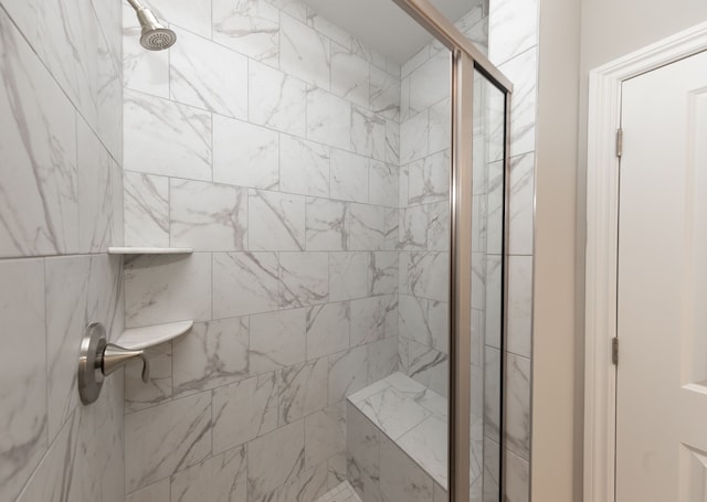 bathroom with an enclosed shower