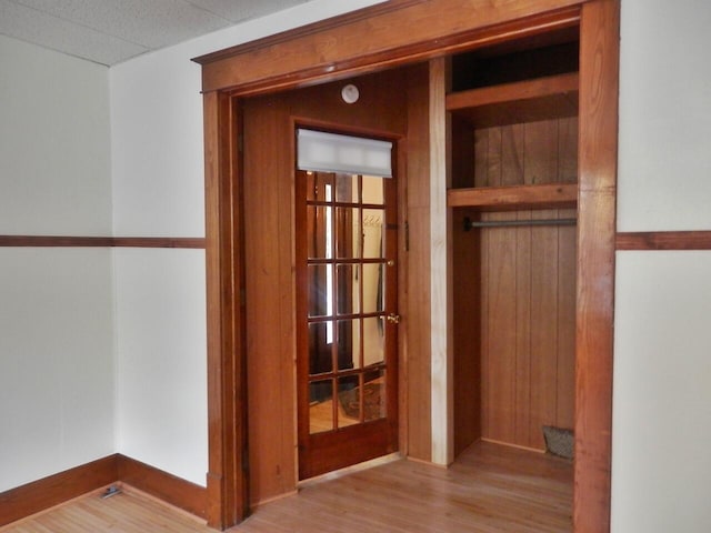 hallway featuring light hardwood / wood-style floors