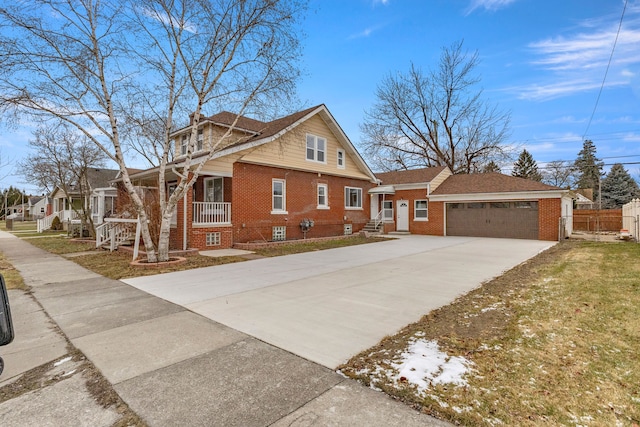 view of front of home featuring a front yard and a garage