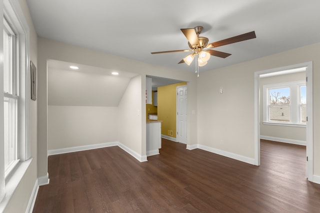 empty room with dark wood-type flooring, recessed lighting, baseboards, and ceiling fan