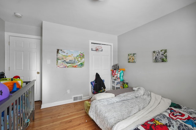 bedroom featuring hardwood / wood-style floors