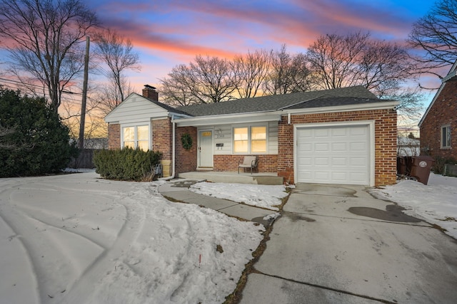 ranch-style home with a garage