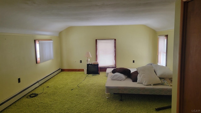 living area with baseboard heating, lofted ceiling, and carpet floors