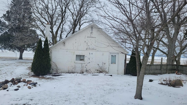 view of snow covered property