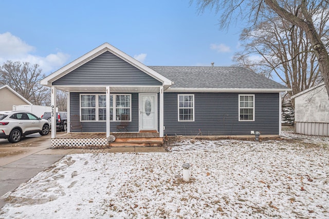 ranch-style home featuring covered porch