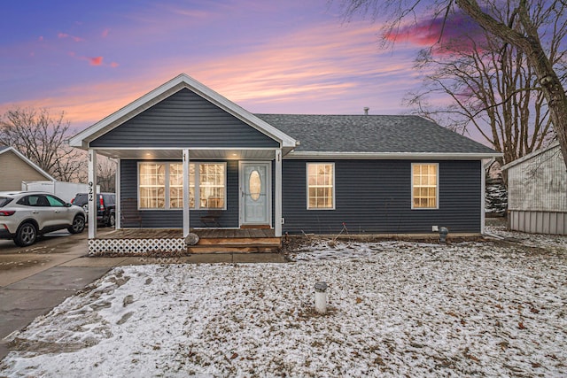 ranch-style house featuring a porch