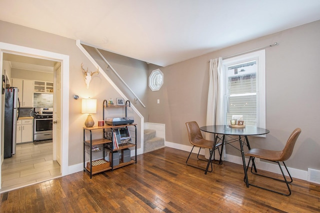 dining room featuring wood-type flooring