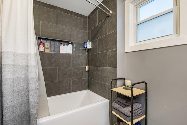 bathroom with shower / tub combo