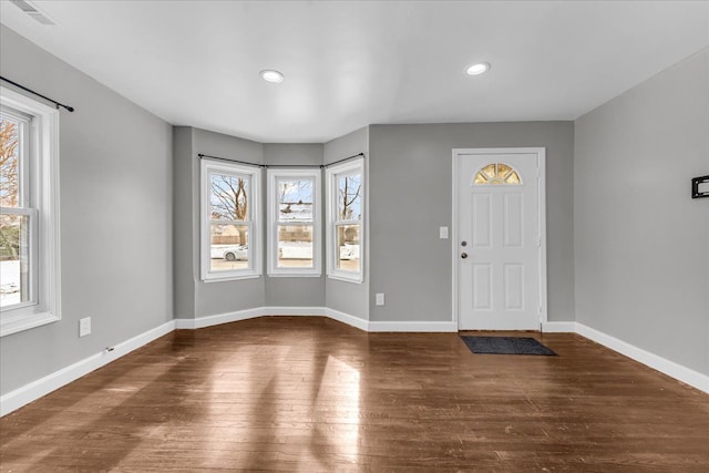 entrance foyer with dark hardwood / wood-style flooring