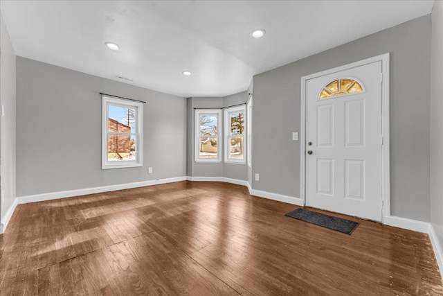 foyer entrance with hardwood / wood-style floors