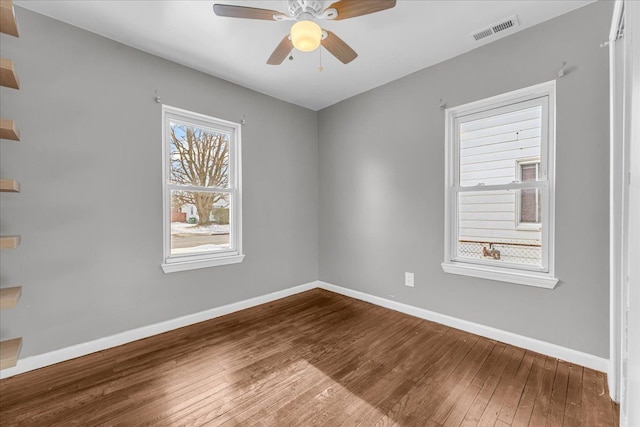 unfurnished room featuring wood-type flooring and ceiling fan