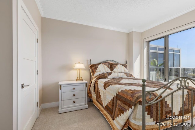 bedroom with a textured ceiling, light carpet, and crown molding