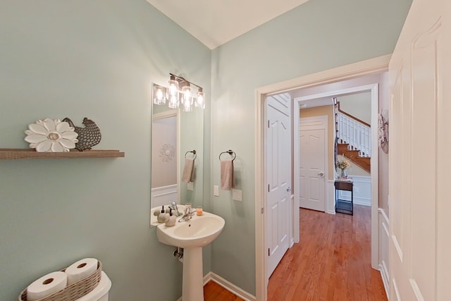 bathroom with wood-type flooring