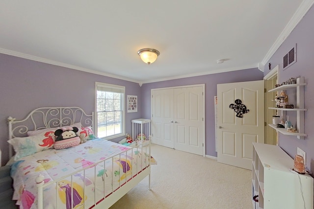 bedroom with crown molding, light carpet, and a closet