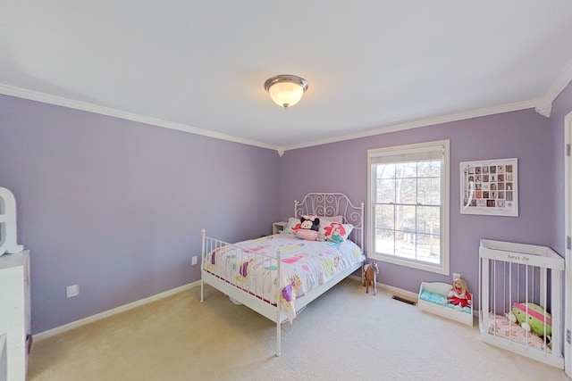 carpeted bedroom with ornamental molding