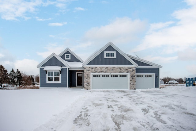 craftsman inspired home with a garage