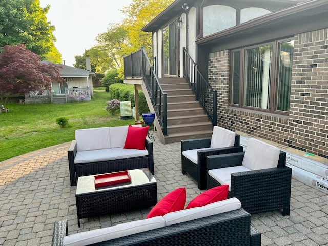 view of patio featuring outdoor lounge area and central air condition unit