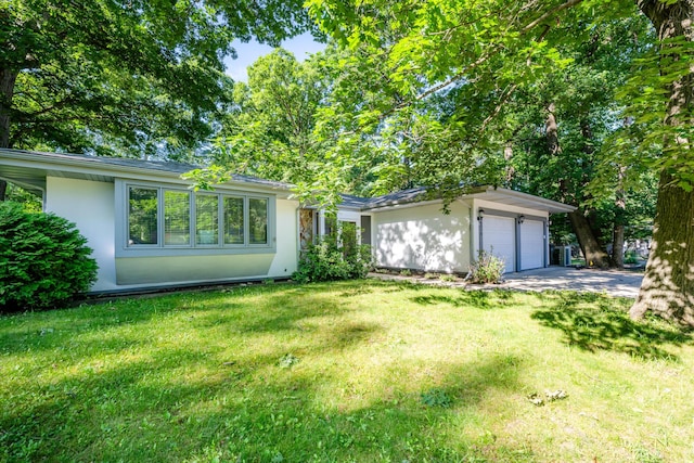 ranch-style home with a front lawn