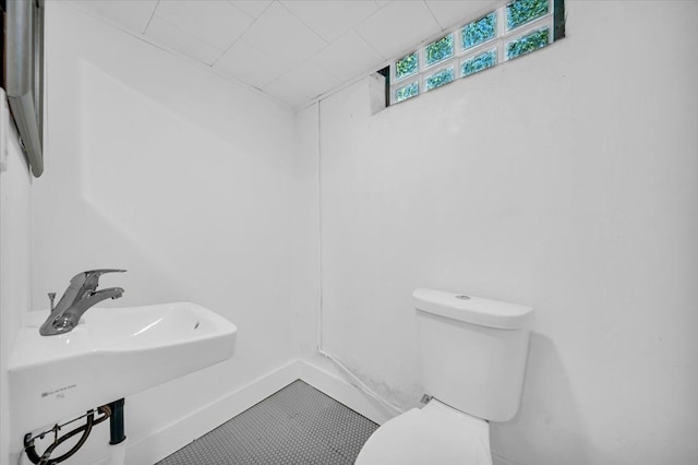 bathroom with toilet and sink