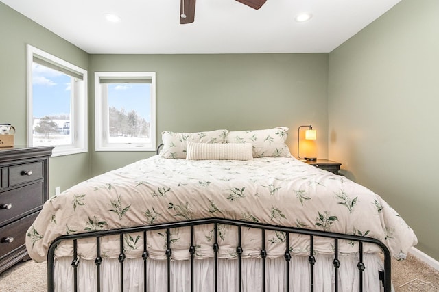 bedroom with ceiling fan and carpet