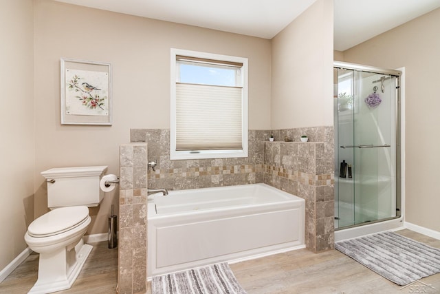 bathroom with separate shower and tub, hardwood / wood-style flooring, and toilet