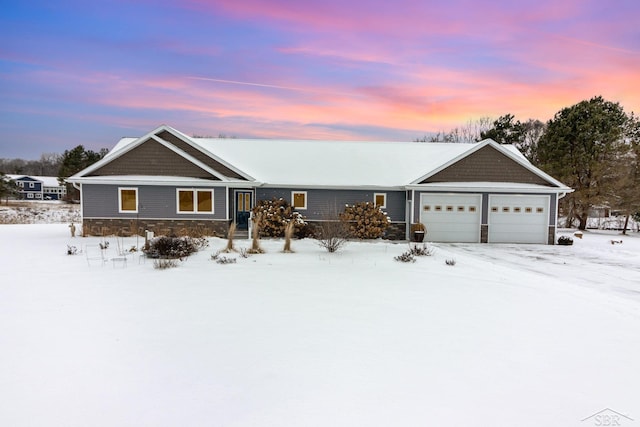 ranch-style house featuring a garage