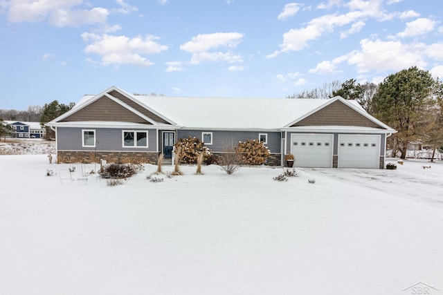 ranch-style home featuring a garage