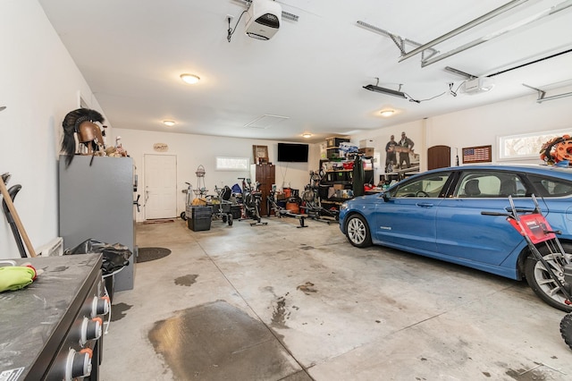 garage featuring a garage door opener