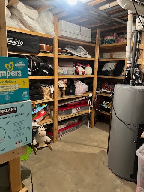 storage room with gas water heater