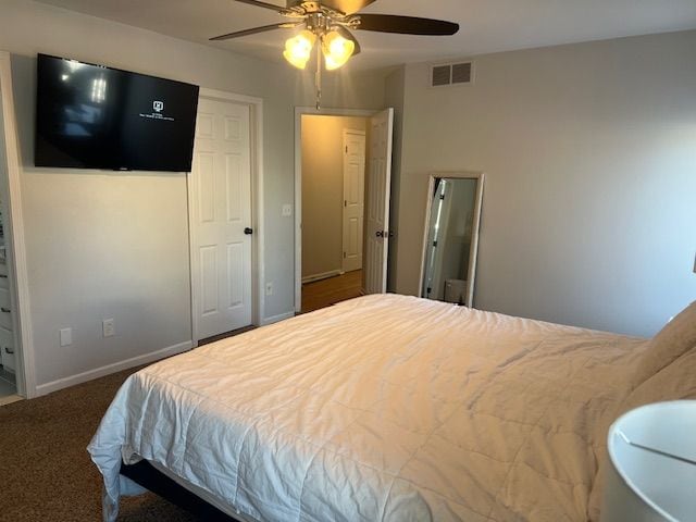 carpeted bedroom featuring ceiling fan