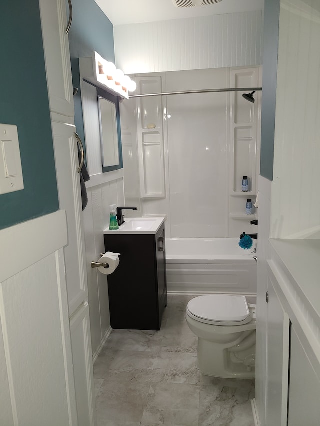 full bathroom with  shower combination, vanity, and toilet